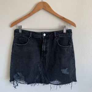 Black denim mini skirt
